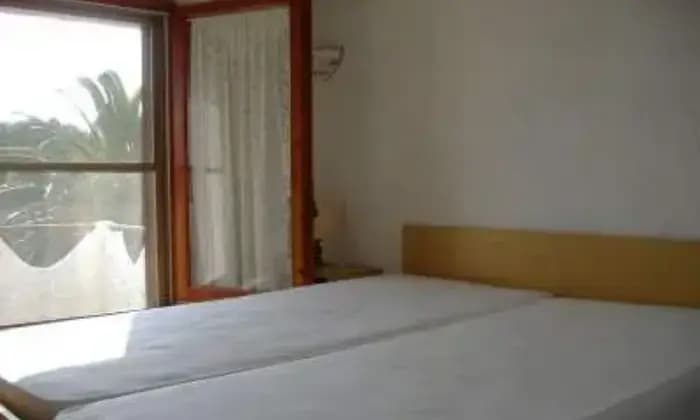 Rexer-Budoni-Appartamento-in-una-villa-vacanze-in-affito-temporaneo-CAMERA-DA-LETTO