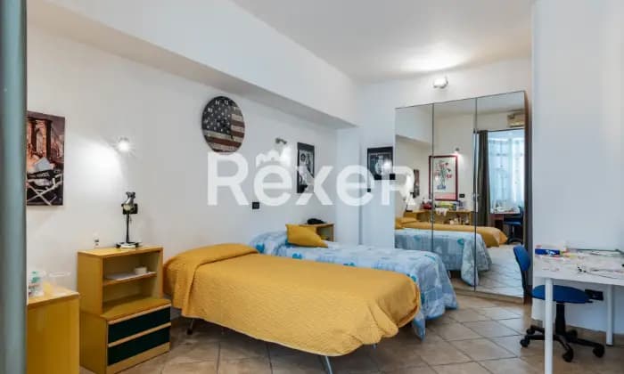 Rexer-Catania-Delizioso-e-luminoso-appartamento-vista-mare-CAMERA-DA-LETTO