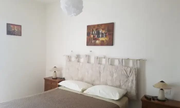 Rexer-Perito-Appartamento-in-vendita-in-via-dei-Greci-CameraDaLetto