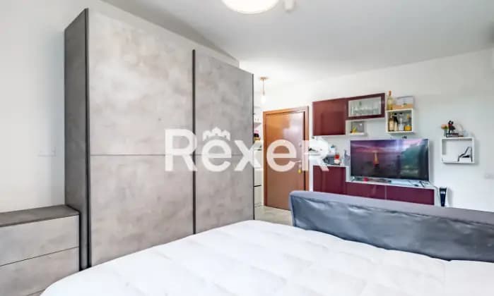 Rexer-Segrate-Appartamento-mq-in-classe-A-con-giardino-cantina-e-posto-auto-CameraDaLetto