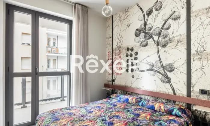Rexer-Torino-Appartamento-composto-da-cinque-locali-con-terrazzo-CameraDaLetto