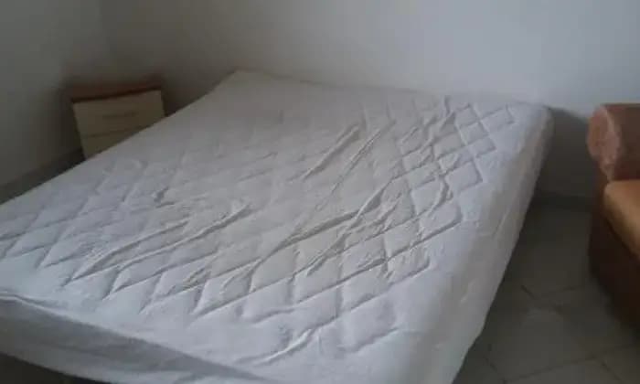 Rexer-Padru-Accoglente-Appartamento-con-ampio-terrazzo-vicino-ad-olbia-CAMERA-DA-LETTO