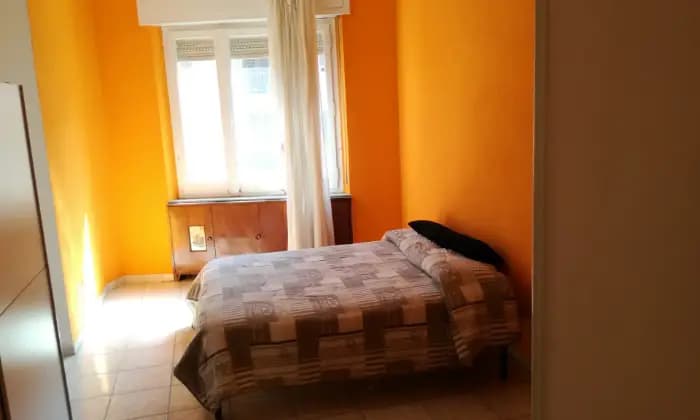 Rexer-Cagliari-Appartamento-per-studentesse-CAMERA-DA-LETTO