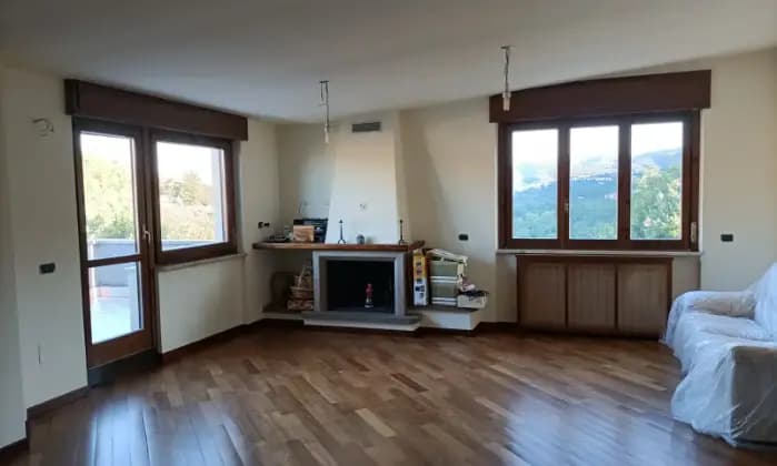 Rexer-Casali-del-Manco-Appartamento-e-mansarda-panoramici-SALONE