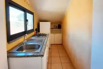 Rexer-Castelsardo-Vendesi-appartamento-con-garage-in-villaggio-fronte-mare-Cucina