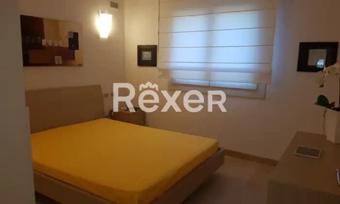 Rexer-Olbia-Olbia-via-Punta-Saline-elegante-e-panoramica-villa-CameraDaLetto