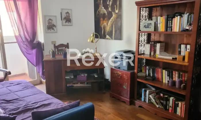 Rexer-Roma-Appartamento-al-villaggio-olimpico-ristrutturato-e-luminoso-CameraDaLetto