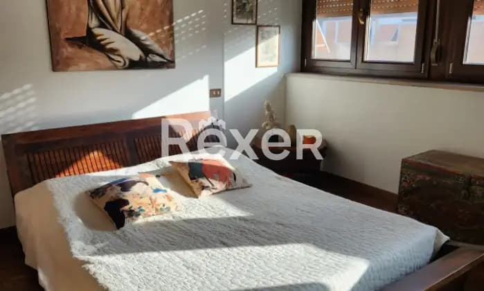 Rexer-Roma-Appartamento-al-villaggio-olimpico-ristrutturato-e-luminoso-CameraDaLetto