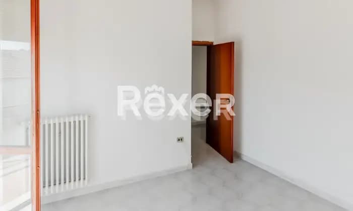 Rexer-Lioni-Luminoso-appartamento-con-balconi-CAMERA-DA-LETTO