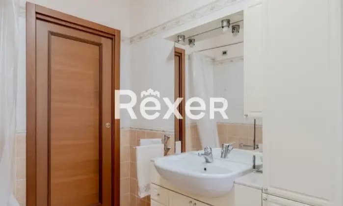 Rexer-Torbole-Casaglia-Trilocale-con-loggia-e-posto-auto-Bagno