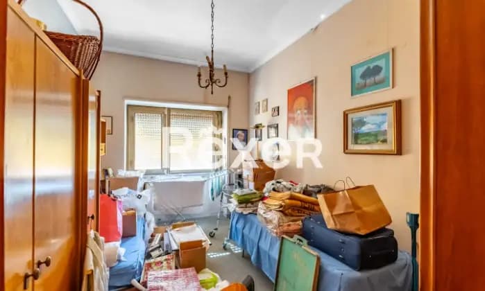 Rexer-Roma-Appartamento-mq-con-cantina-mansarda-e-posto-auto-CameraDaLetto