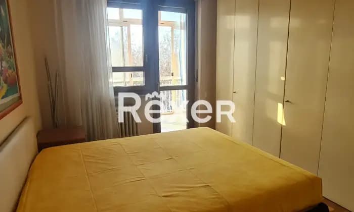 Rexer-Torino-Piazza-Conti-di-Rebaudengo-Trilocale-mq-con-ampi-balconi-CameraDaLetto