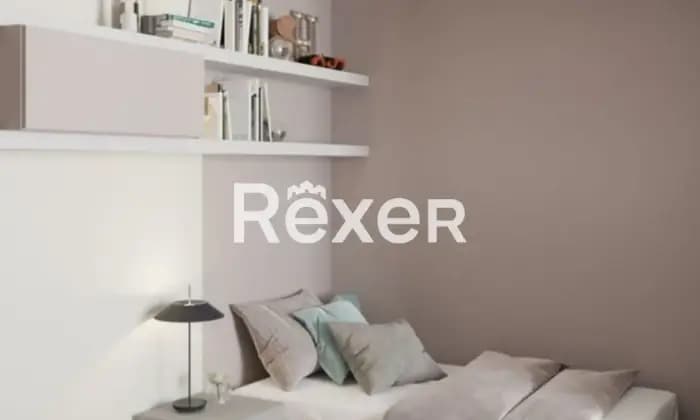 Rexer-Sanremo-Appartamento-tre-locali-con-ampi-balconi-CameraDaLetto