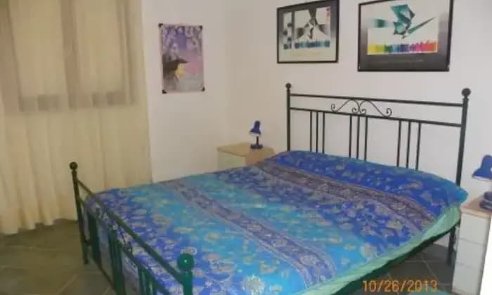 Rexer-Loiri-Porto-San-Paolo-Appartamento-fronte-isola-di-tavolara-CAMERA-DA-LETTO